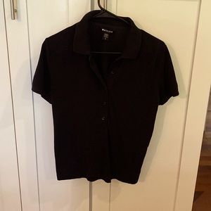 Athleta black golf shirt size small.